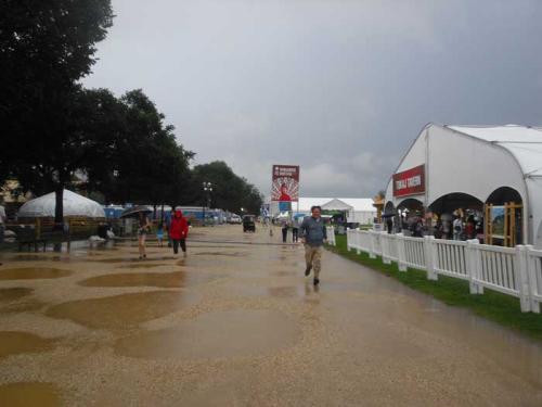 Rain falls on the National Mall on June 28, 2013, day 3 of the 2013 Smithsonian Folklife Festival. Photo by Sojin Kim