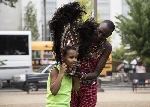 Just trying on a Maasai head piece for size.