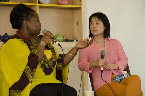 Performers Iddi Achieng' and Wu Man in a cross-program  discussion on women and music in Teahouse Commons.