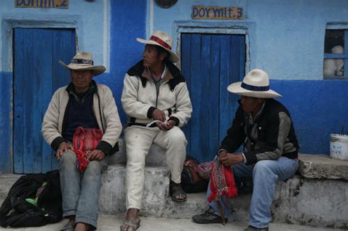 Victoriano Arizapana Huayhua (center), and other community members from Huinchiri work to maintain the sacred Q'eswachaka bridge. Photo by Cristina Díaz-Carrera, Ralph Rinzler Folklife Archives