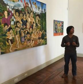 Brus Rubio explaining his work. Photo by Jackie Flanagan Pangelinan, Ralph Rinzler Folklife Archives