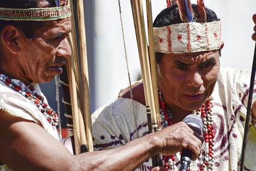 The Wachiperi people of the Peruvian Amazon retain many traditional ways of life, such as wearing clothing made of tree bark and using bows and arrows to hunt. On the Mall, they are demonstrating their archery skills. Photo by Ronald Villasante, Ralph Rin