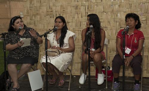 At El Hablador, Wachiperi scholar Nely Margot Ninantay Yonaje (second from left) shared her community's efforts to preserve their language with Danna Gaviota Tello Morey and María Nieves Nashnato Upari from Radio Ucamara. Photo by Brian Barger, Ralph Rinl