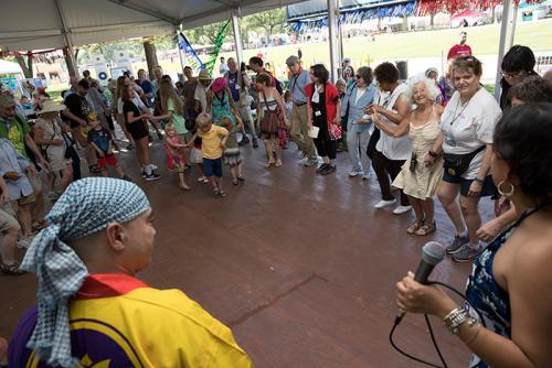 FandangObon got the audience circling around the Sounds of California Stage &amp; Plaza with a mix of Japanese and Mexican dance traditions. Want to join in? You have no choice! Just dance! Photo by Francisco Guerra, Ralph Rinzler Folklife Archives