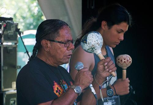 Stan Rodriguez (left) shares a song at the Sounds of California Stage &amp; Plaza, accompanied by Raymond Martinez. Photo by Hank Douglas, Ralph Rinzler Folklife Archives