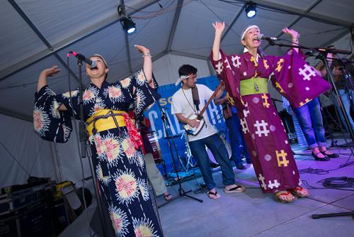 <em>FandangObon</em> gave their last Folklife Festival performances today, with Nancy Sekizawa and Nobuko Miyamoto leading the singing and dancing. Tomorrow they head back to Los Angeles. Photo by Walter Larrimore, Ralph Rinzler Folklife Archi