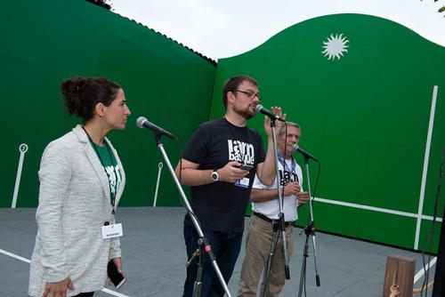 The <em>bertsolaris</em> shared their Basque oral poetry tradition at the Frontoia, improvising verses about Independence Day and finding love. Left to right: Irati Anda, Xabier Paya, and Martin Goicoechea. Photo by Walter Larrimore, Ralph Rin