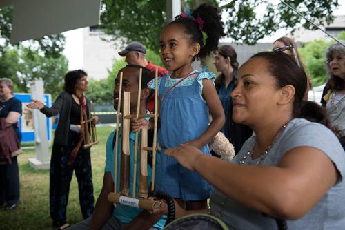 House of Angklung, an Indonesian performance group in D.C., brought their bamboo rattles for visitors to play. Each instrument makes only one note, but played together as a community we can make a melody. Today's melody was "Twinkle, Twinkle, Little 