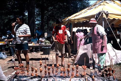 Visitors at the 1974 Folklife Festival could learn the salmon roasting method and taste test the results. Photo by Reed &amp; Susan Erskine, Ralph Rinzler Folklife Archives