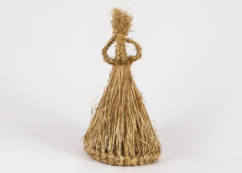 A conical headpiece of unplaited straw with a tightly braided band at the base, and decorative braided loops at the top with a tufted straw point.  