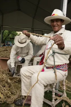 The slow process of creating rope continues with the bridge builders.