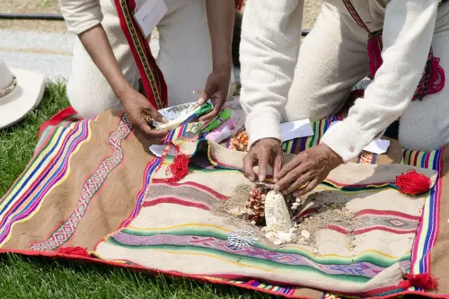 Ritual offerings are made throughout the bridge building process.