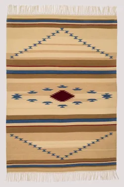 A vertical, rectangular, loom-woven wool rug with horizontal stripes of beige, tan, brown, dark blue, and dark red, featuring geometric patterns in dark blue and red throughout, as well as a row of tassel fringe at both top and bottom.